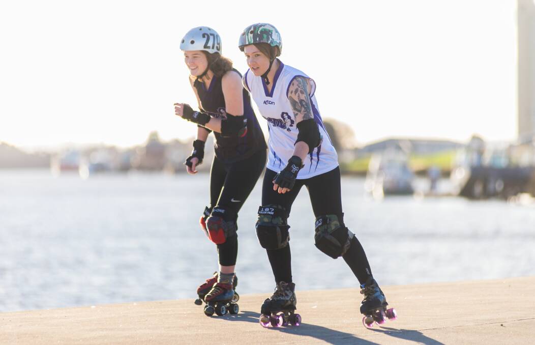 TOP SHOT: Megan 'JP' O'Donnell-Bennetts, of South Launceston, with Samara 'Rambo Sambo' Digney, of Newstead, will play off against each other in a roller derby showdown on Saturday. Picture: Phil Biggs