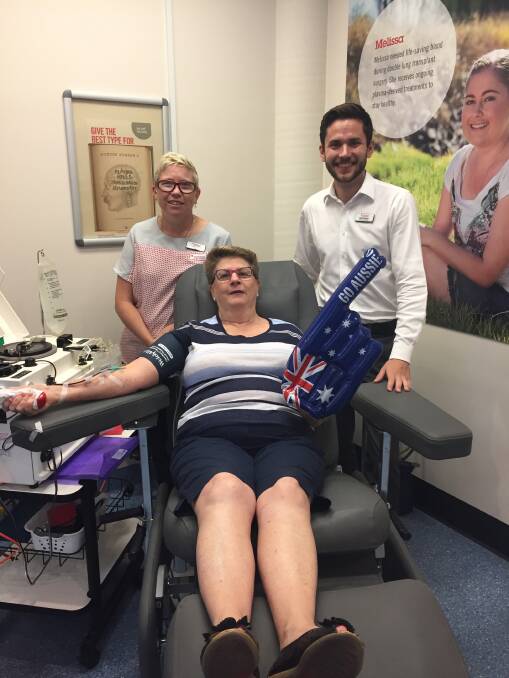 Feeling patriotic: Donor Nola Bath, Blood Service nurse Ange Callaghan and Community Relations Officer Felix Palmer are urging others to give blood leading up to Australia Day.