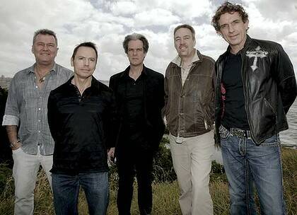 Steve Prestwich, second right, has died after surgery to remove a brain tumour. Here he is pictured with his Cold Chisel band mates in Decmber 2009.