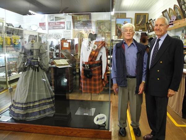 Eric Richardson and Ian Sinclair next to the new cabinet at Wingham Museum. Mr Sinclair presided over a special opening ceremony the week of the Scottish Festival.