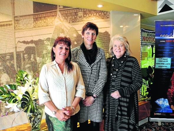 Councillors Kathryn Bell and Mave Richardson welcome Charlotte Descamps at her talk at Wingham RSL. 