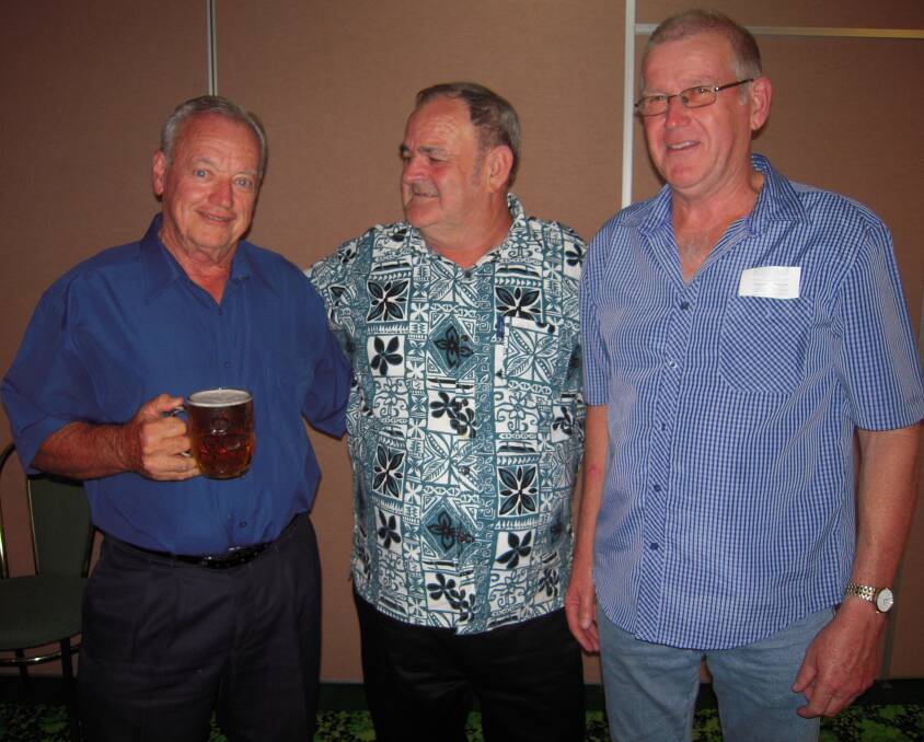 Ex WSC president Ron Wilson with his birthday mug, WSBWFC president Jack Muxlow and WSBWFC life member Neil Miller