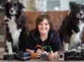 Jacob Sherd, 12, pictured with his border collies Douglas and Kevin, is one of a growing number of young people with a passion for film photography. Picture by Sitthixay Ditthavong