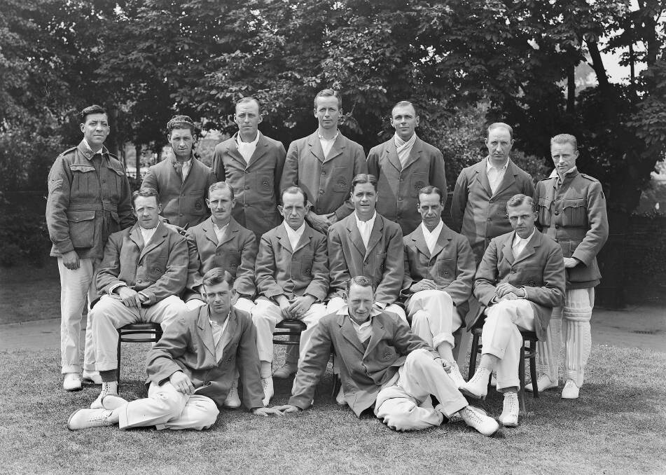 TRIUMPHANT: The AIF cricket team in 1919 captained by future Test player Herbie Collins (middle row, third from left) with wicketkeeper Bert Oldfield (back row, right) who was buried alive by a shell explosion at Polygon Wood in 1917. Picture: AWM D00685