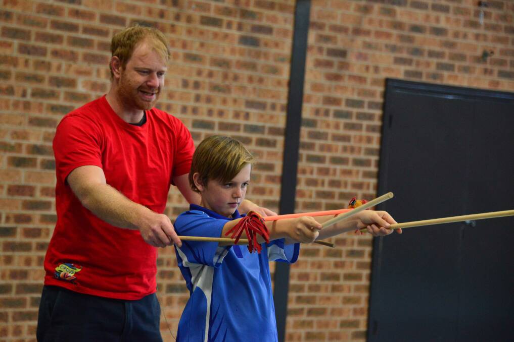 Workshop: Trainer Luke Taylor with Malachi Clarke from Manning Gardens Public School. Photo: Julie Slavin.