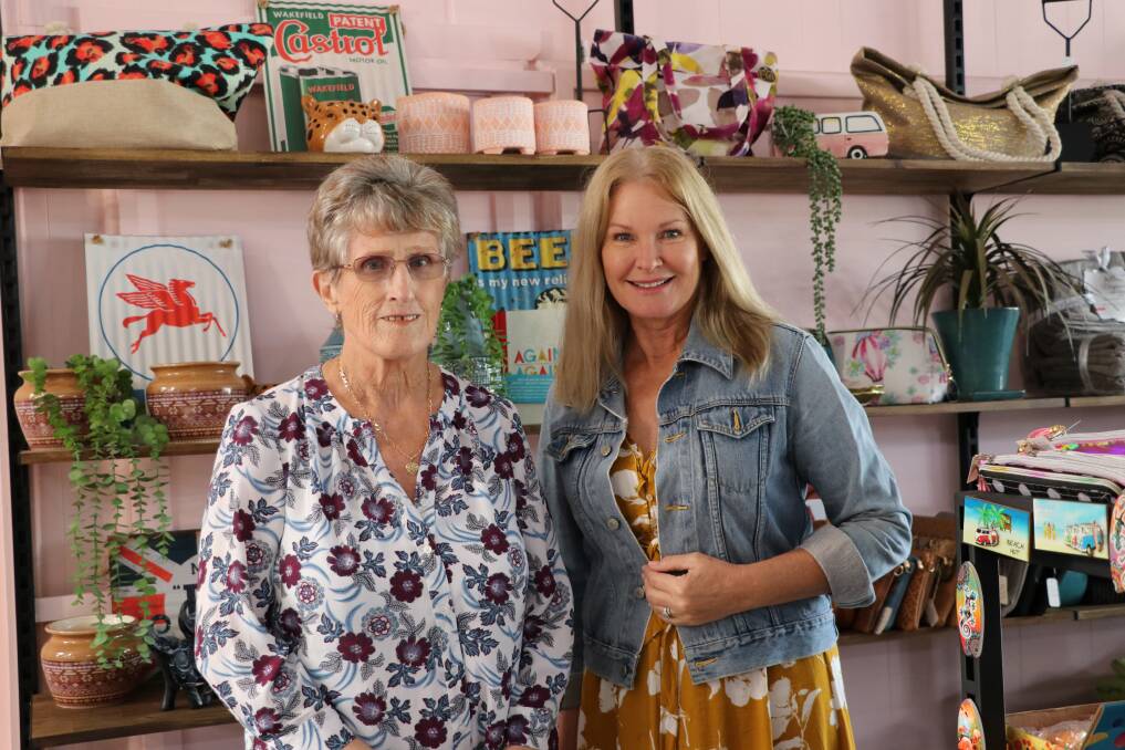 Volunteer Rita Palmer and shop manager Beth Byrne.