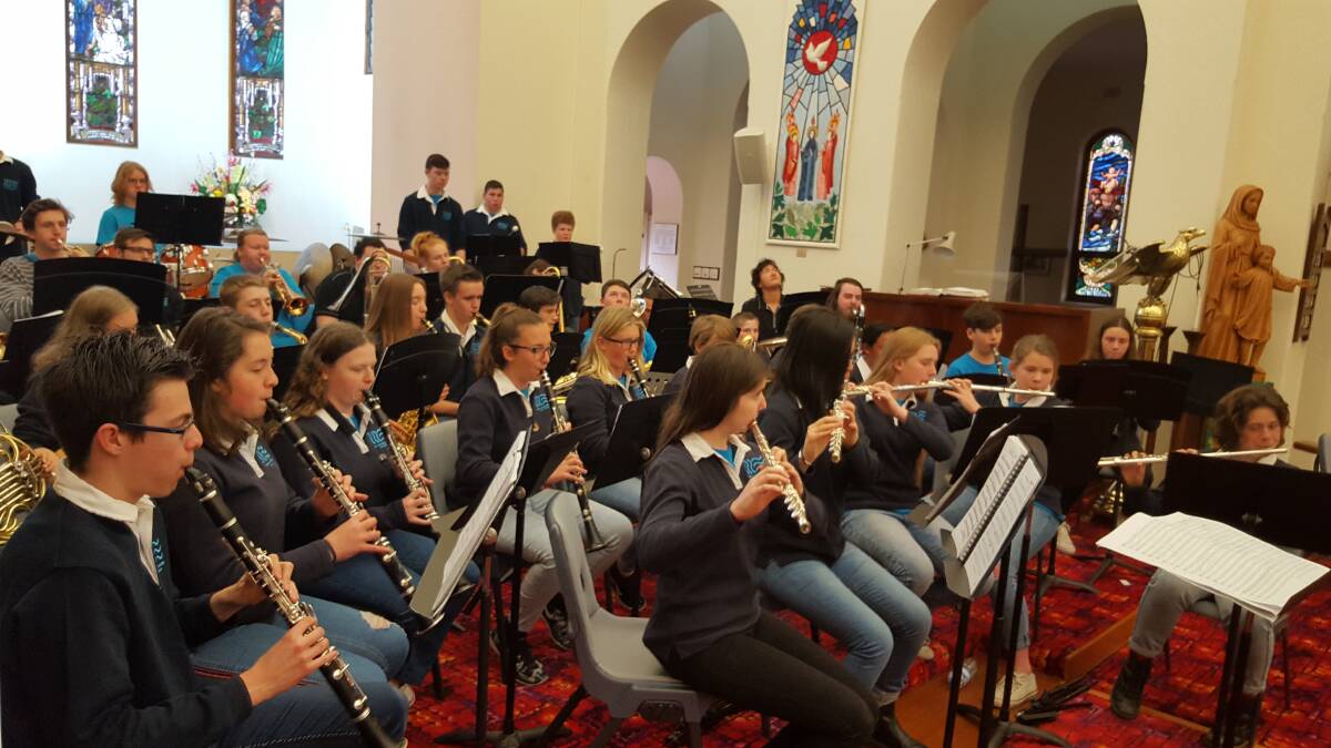 Entertaining: Hunter Wind Ensemble members during their performance in Taree.