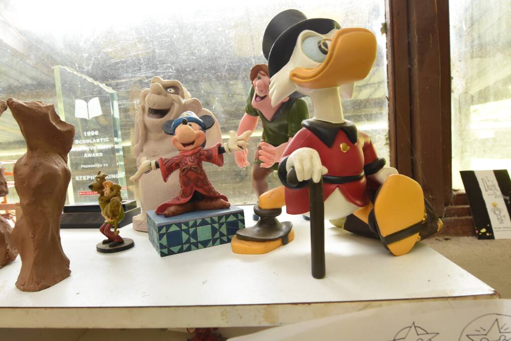 On display: Many of the Disney figurines in Stephen's studio were gifts.