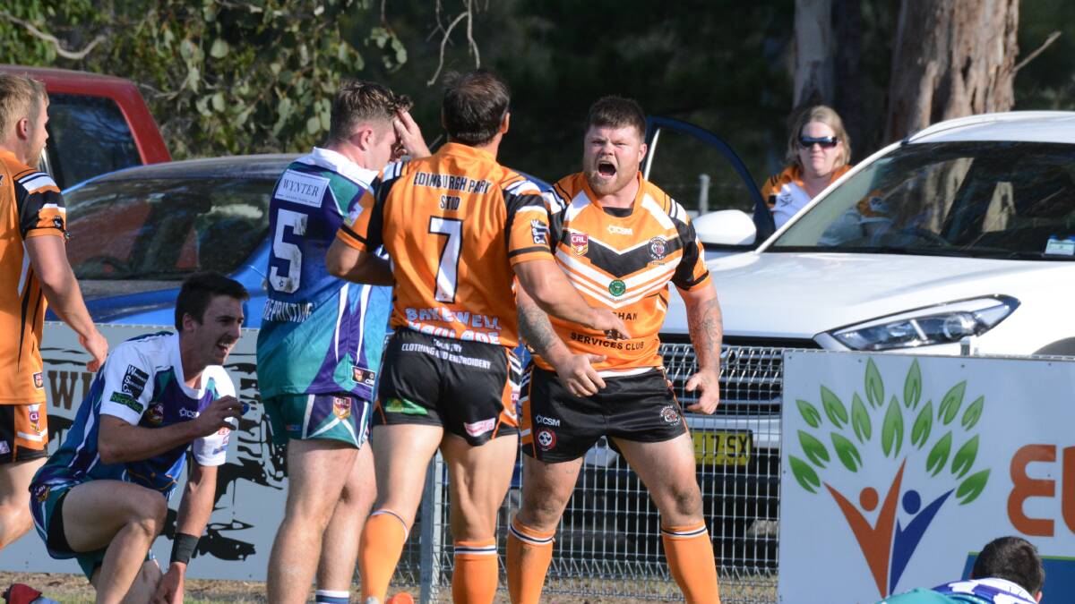 Tiger roars: A jubilant Nick Beacham after scoring the first of his two tries in the Group Three Rugby League game against Taree City at Wingham. The Tigers won 50-12