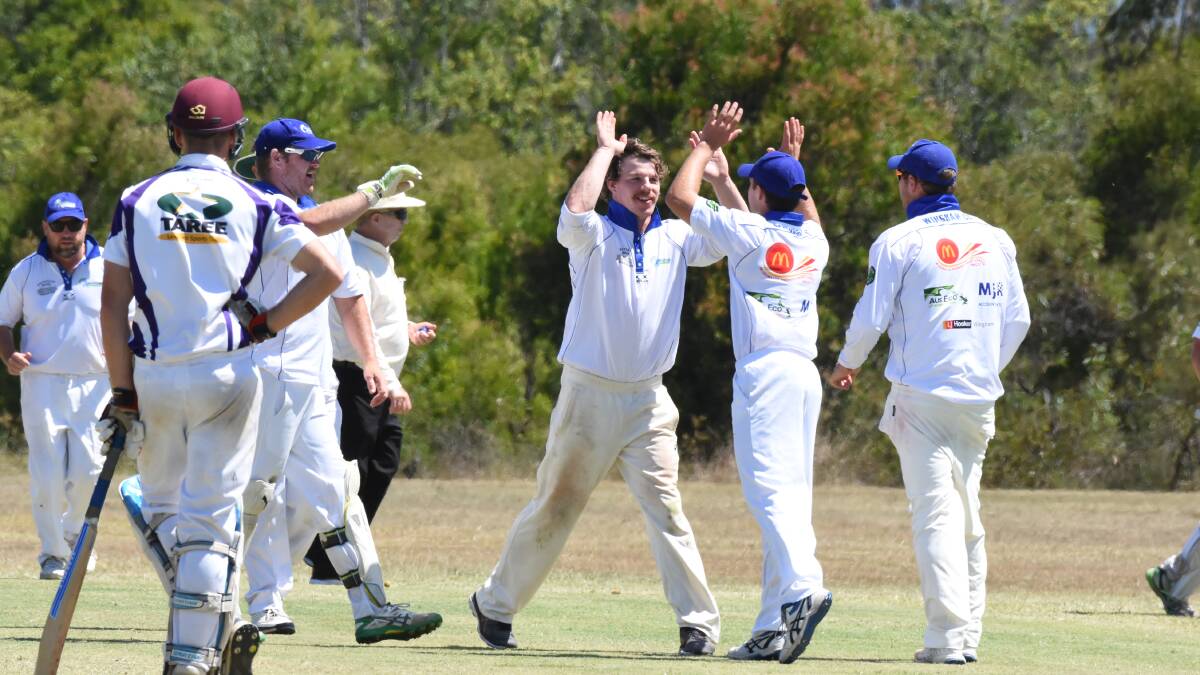 Wingham players celebrate taking a wicket during the clash against United at Cedar Party Reserve.