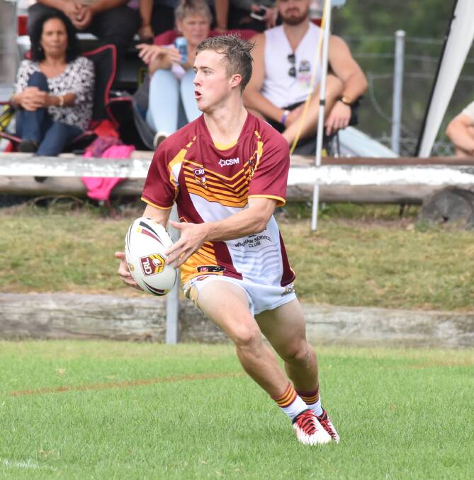 Forster-Tuncurry's Riley Glover looks for support during the Group Three/Group Two under 23 representative clash at Wingham.