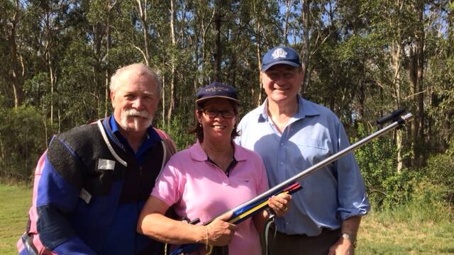Rifle club statistician Tony Moon with Sue and Steve Bromhead.