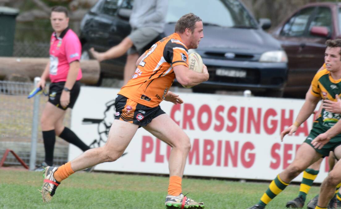 Former North Coast under 23 second rower Jake Mullen takes the ball up for Wingham in the June 2 clash against Forster-Tuncurry. The Tigers meet Wauchope on Saturday at Wingham.