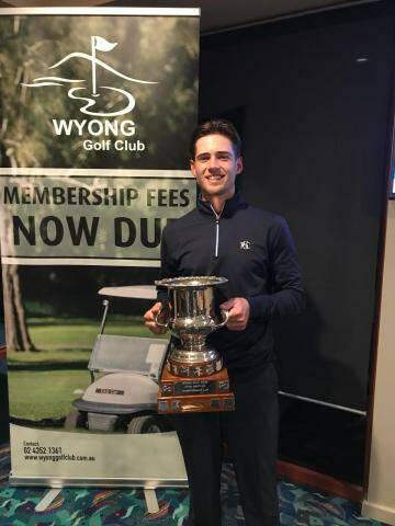 Reid Brown with his trophy for winning the Wyong Open.