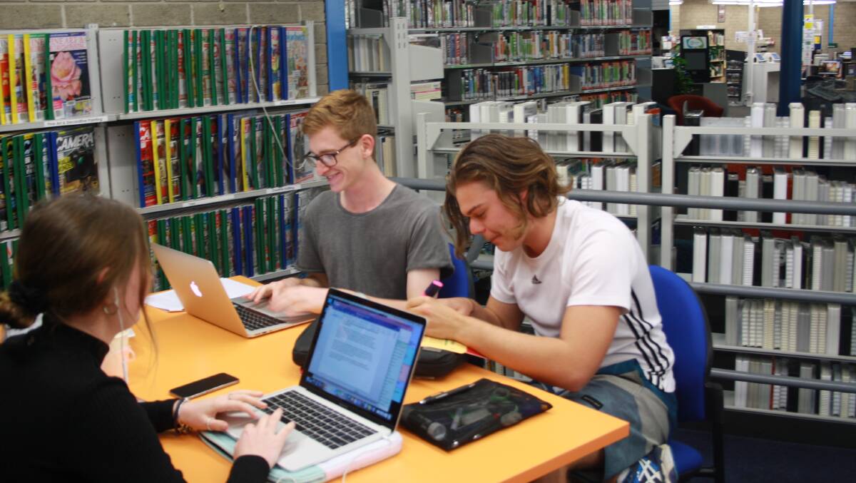 Previous HSC students take advantage of library study nights.