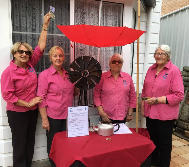 Quotarians Nancy Boyling, Deb Steberm, Christine Gibbons and Jeanette Holland with the upside down umbrella they will be using to raise funds for rural women and their families doing it hard.