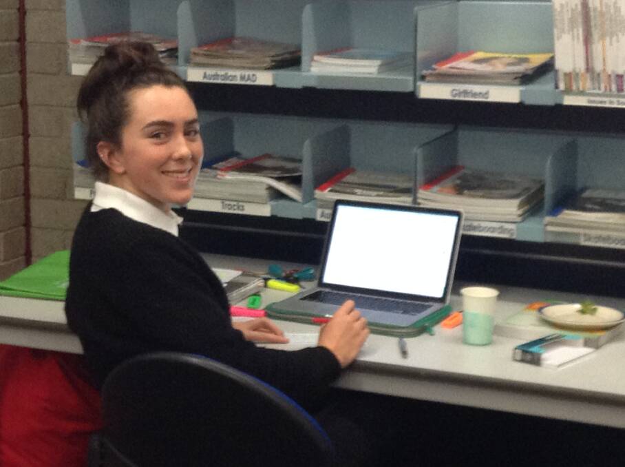 Georgia Lowry grabs some quiet space in the library at a HSC study night.