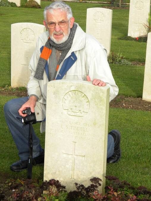 Peter at his great uncle's grave at Villers Bretonneux Commonwealth War Graves Cemetery on November 10, 2010.