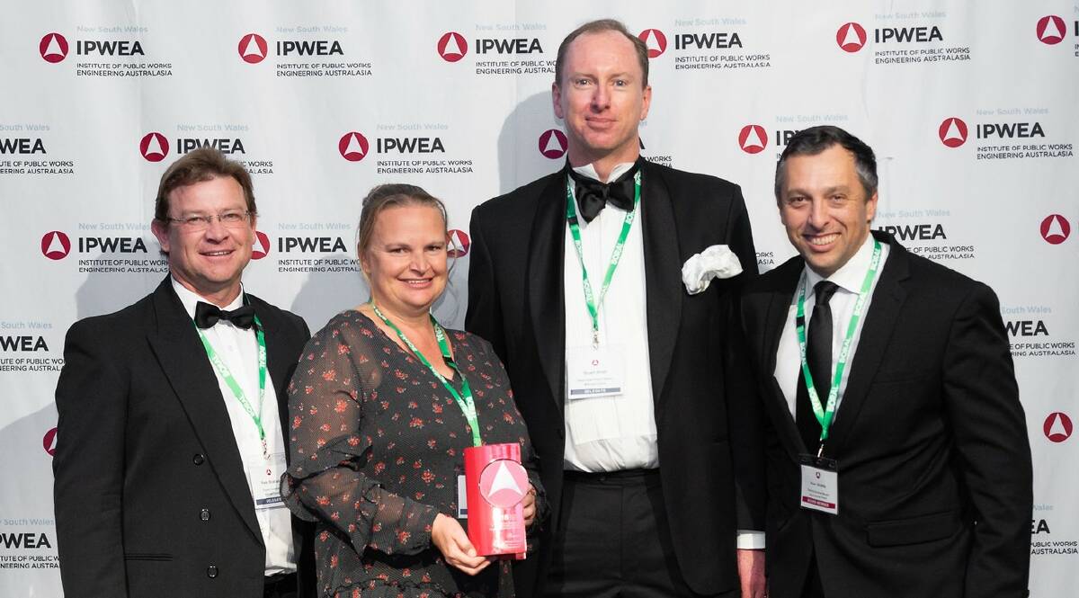 MidCoast Council award winning staff, Peter Brabant, Amy Hill and Stuart Small, MidCoast Council, with IPWEA (NSW) vice-president, Peter Shields.