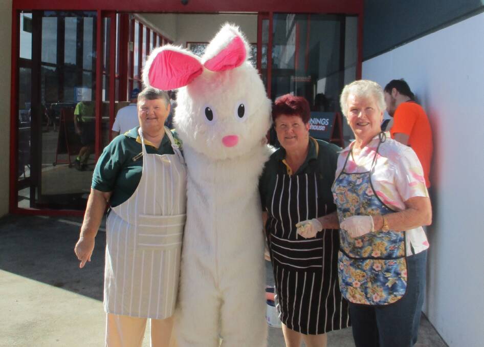 The Easter Bunny paying a visit to Tinonee Historical Society's barbecue at Bunnings  with members Pam Muxlow, Jenny Cherry and Barbara Waters.