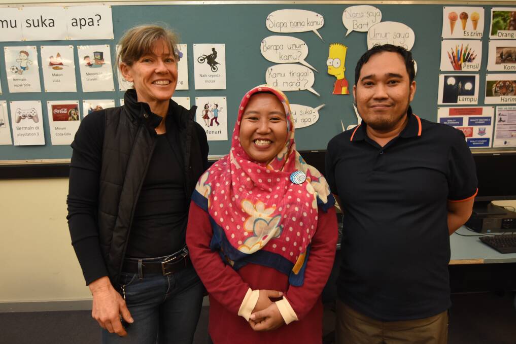 Collaboration: Wingham High School Indonesian teacher Anne Thornton with visiting teachers Yesi Cahyani and Pajar Wolverine from Borneo. Photo: Scott Calvin