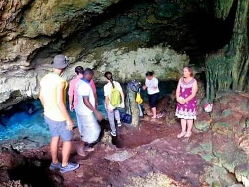 Visitors from all over the world visit Kuza Cave and swim in the healing mineral water.