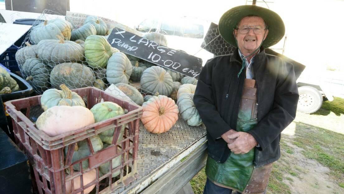 Dave Flannery selling pumpkins at Wingham Famers' Market last year.