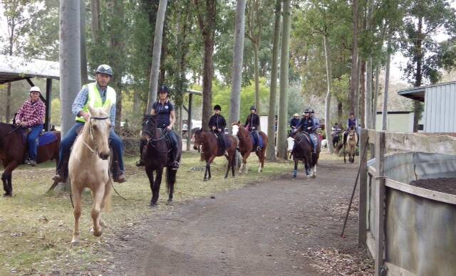 Taree Equestrian Centre's Richard Paff escorting trail riders in 2017. Anyone with a horse is welcome to enter the event again in 2018.