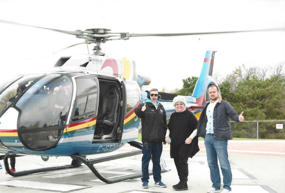 Flying high: Wingham's Monica Stone has returned from an eight week adventure overseas which took her to such places as Dubai, Devon and Bangkok as well a helicopter ride over Niagara Falls in Canada.