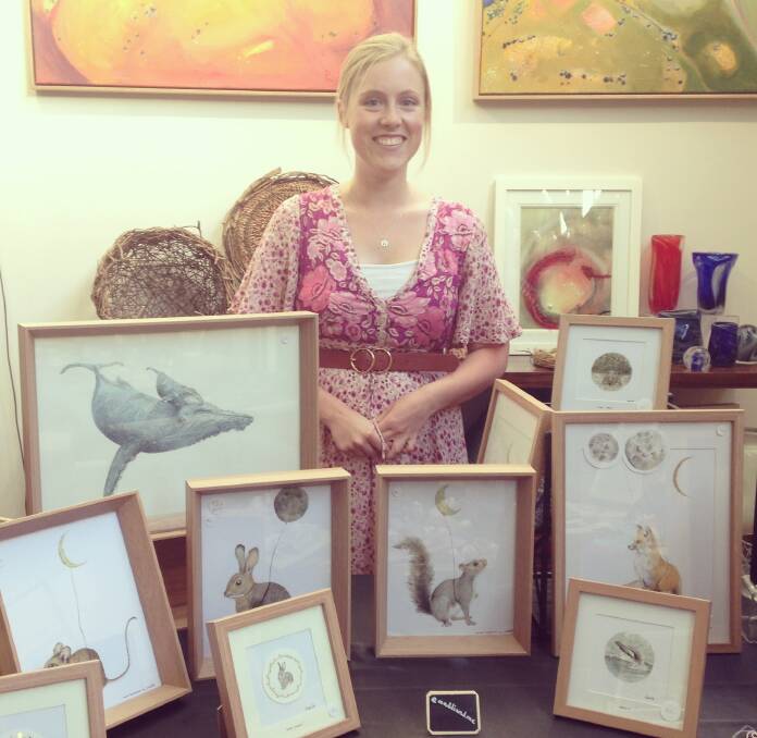 Monique Fedor with some of her art.