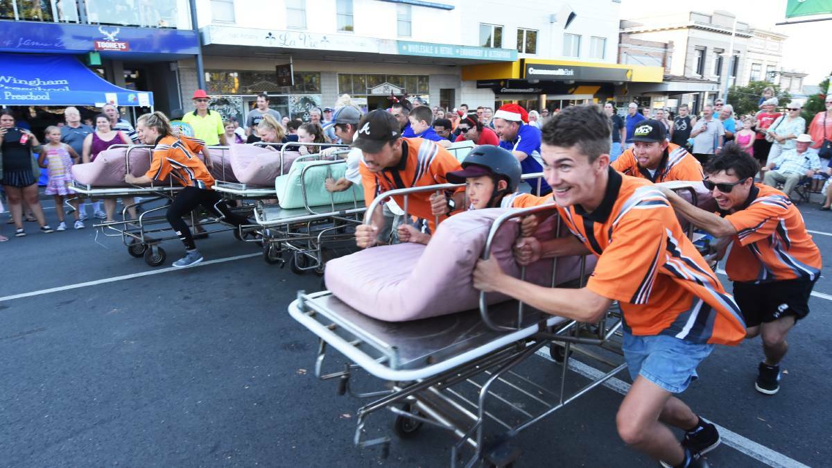 Team challenge: The bed races are a popular attraction at the Wingham Christmas Carnival. Santa will also pay a visit. Photo: Scott Calvin