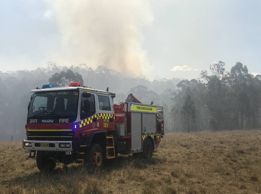 Wingham's new fire tanker on site as fire crews fight a large grass bush fire at Nowendoc Road just past the Mount George turn off.