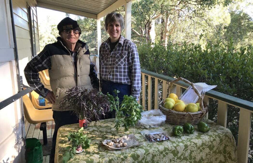 Burrell Creek Hall property office Paul Buckingham with Secretary Helen Scarr with some fresh local produce.