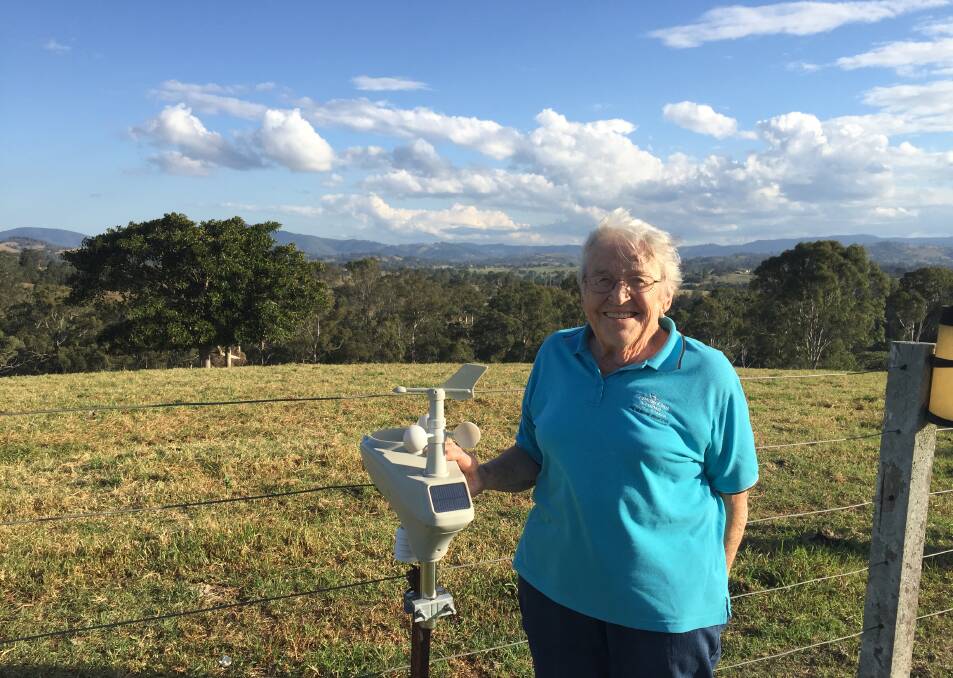 Proud Wingham resident Noreida Fotheringham checking for rain at her Wingham home. Rain might be in short supply right now but according to Noreida, community spirit is plentiful.