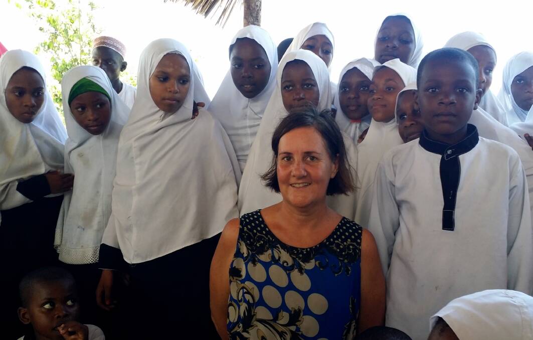 Natalie Denmead, founder of Kuza Cave Culture Centre, with some of the Zanzibar residents who have come to learn about Swahili history and culture at the ancient sacred cave.