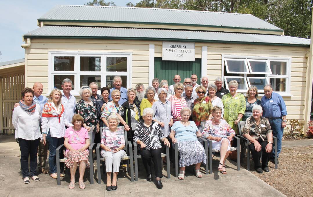 Guests David West and wife Maureen, David Gillespie and wife Charlotte with past pupils in front of the Kimbriki Public School during the 150th anniversary celebrations.