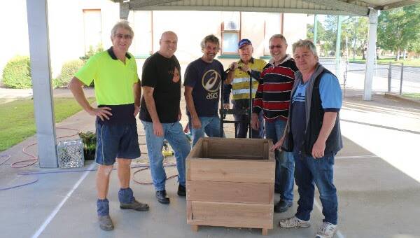 Wingham Chamber of Commerce members volunteered their time to make planter boxes as part of the Wingham Activations Blitz Weekend last year. The chamber has shared 200 community generated ideas to enhance the town.