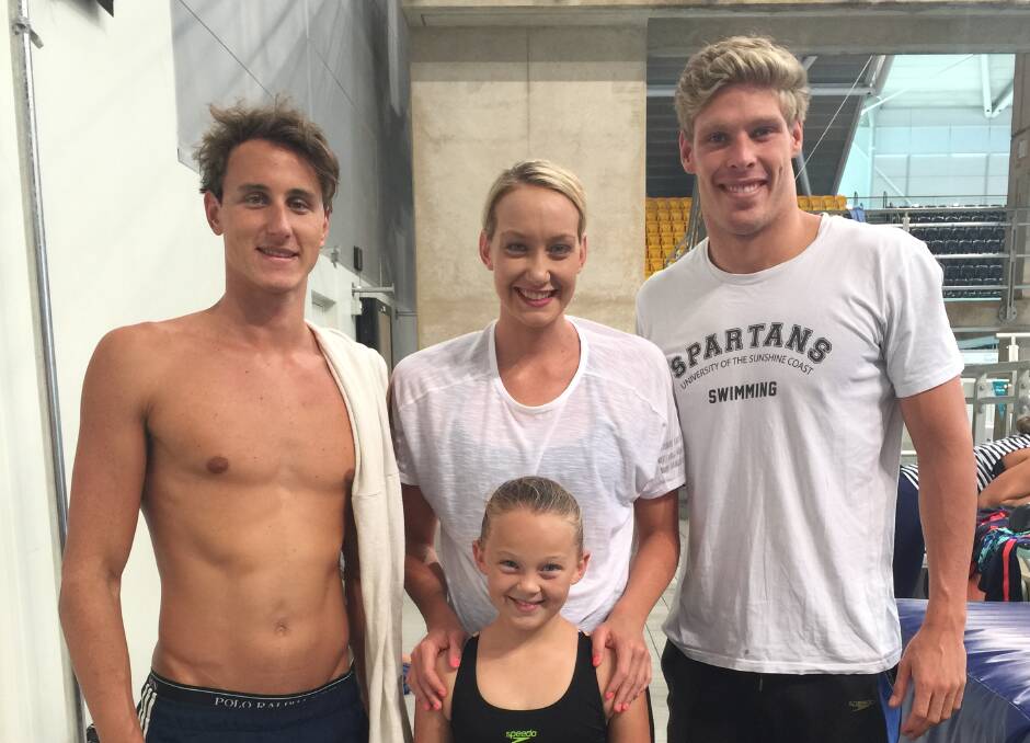 Dream come true: Olympians and current Australian Dolphins Cameron McEvoy, Madison Wilson and Jake Packard with Wingham Swimming Club's Lauren Oberg at Sydney Olympic Aquatic Centre. Photo: Submitted