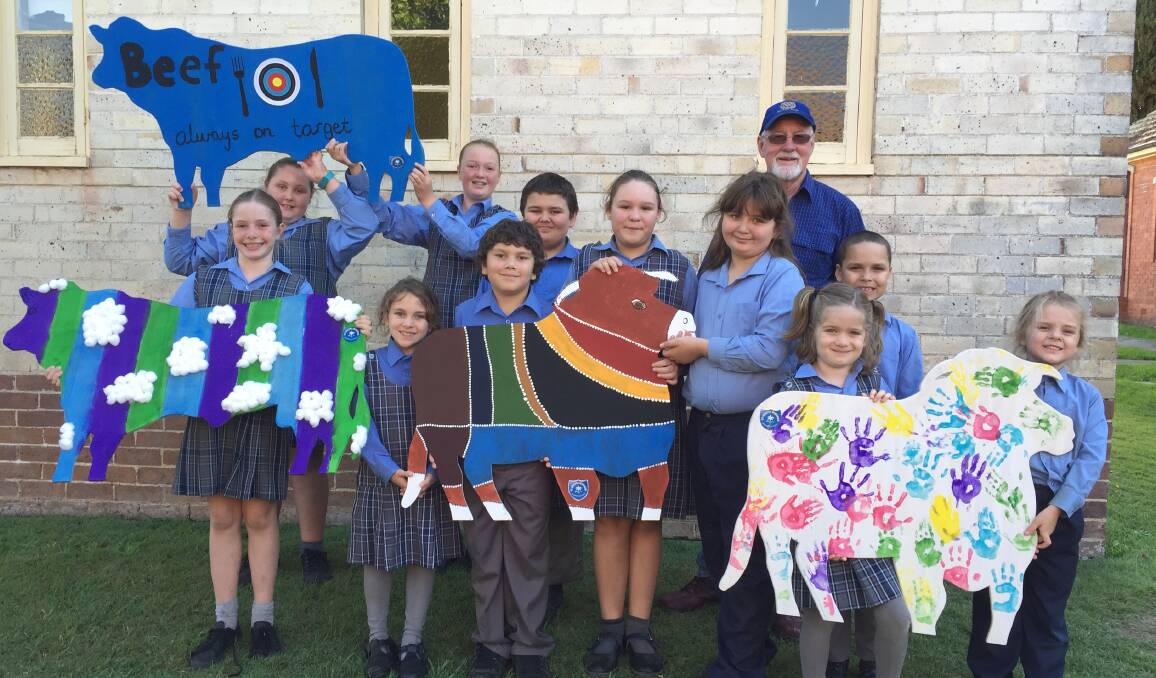 Creative promotion: Children from St Joseph's Wingham with their decorated ply cattle to help promote Wingham Beef Week.