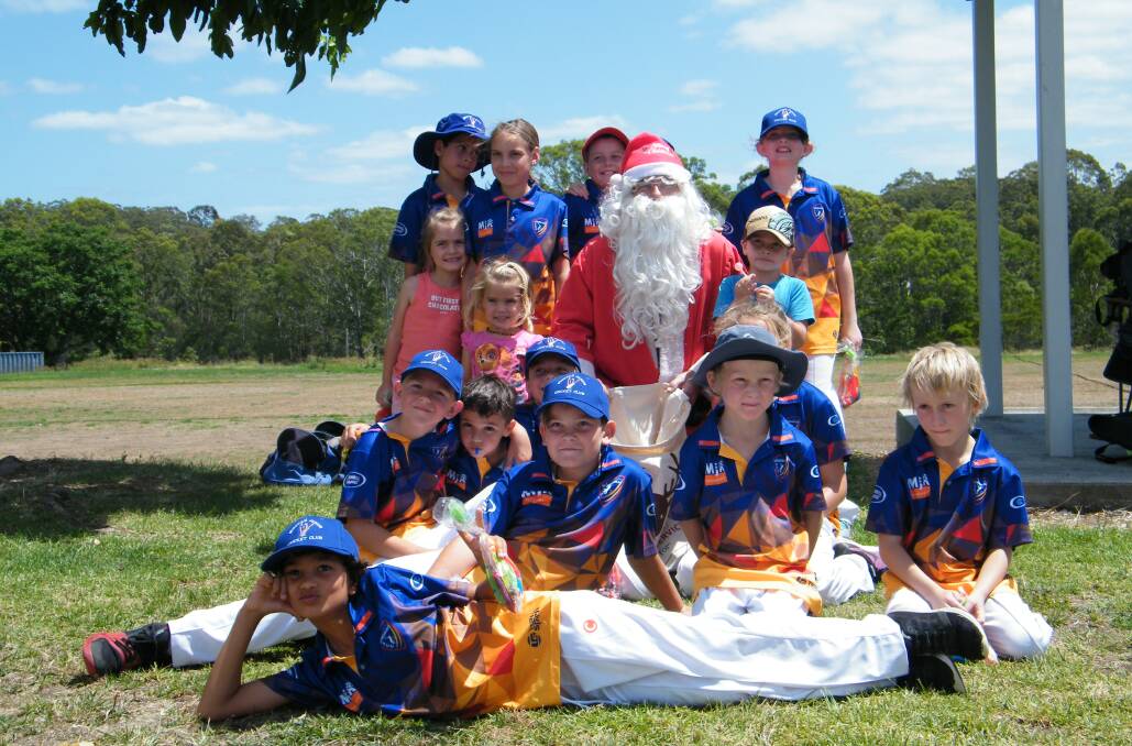 Some of Wingham Junior Cricket's under 10's Thunder and Sixers squads enjoying a catch up with Santa.