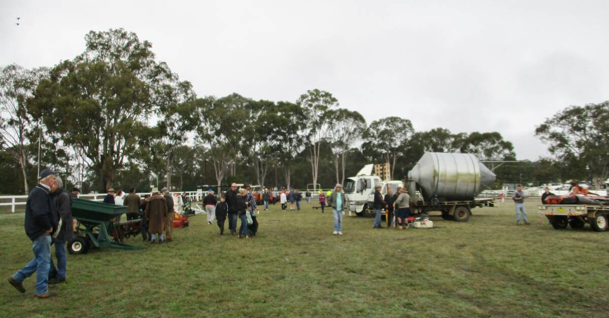 Too big for the boot: Wingham Rotary Clubs Car Boot Sale at Wingham Showground on Saturday, July 6, drew a crowd despite the damp weather, with the machinery on offer. Photo: Pam Muxlow.