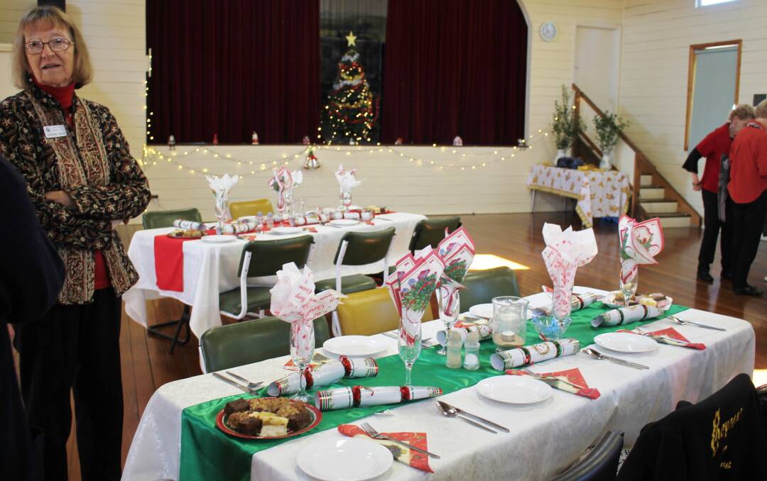 Probus members start to gather for their Christmas in July dinner at Tinonee Memorial Hall.