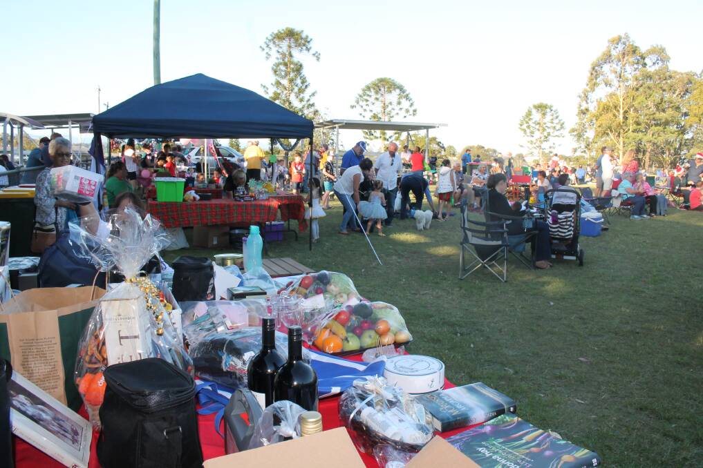 Carols: A great crowd gathered for Carols in the park with loads of lovely raffle prizes to be won.