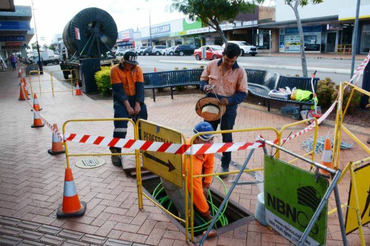 NBNCo technicians at work during the process of installing the fibre optic cables through Taree's central business district. The new Telecommunications Industry Ombudsman Small Business Team will provide a free, independent, and effective complaint resolution service relating to internet and phone service issues.