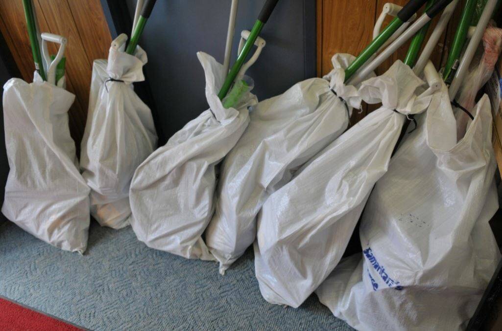 Bagged and ready to gift: Fire Recovery Kits are critical to helping people to begin searching their properties for possessions, and clearing sites of debris. 