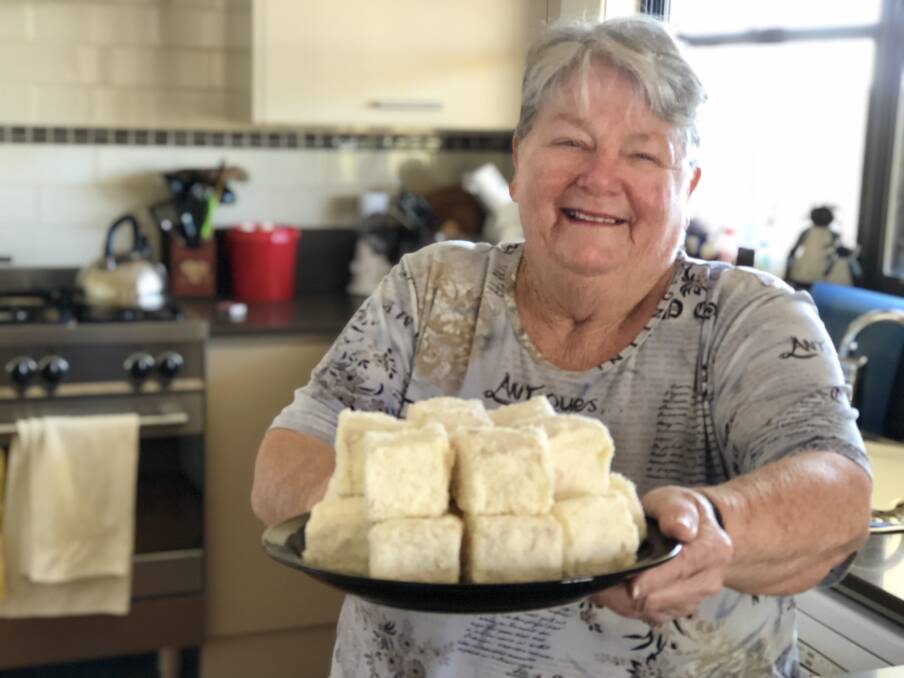 Margaret Ezzy OAM with her 'albino lamingtons'. Photo: Ainslee Dennis.