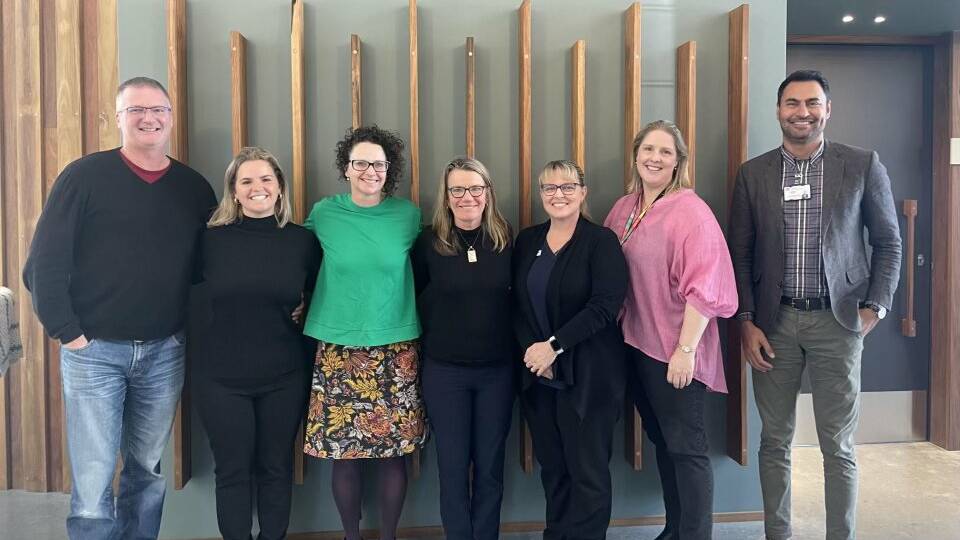 Mark Drury, CEO Dundaloo; Anna and Cath, Cath Cosgrave Consulting; Kate Dunn, Sally Gibson, CEO Early Connections; Bree Katsamangos, program manager Mission Australia; Jami Ahmad, manager social work Manning Base Hospital together for training. Picture supplied.