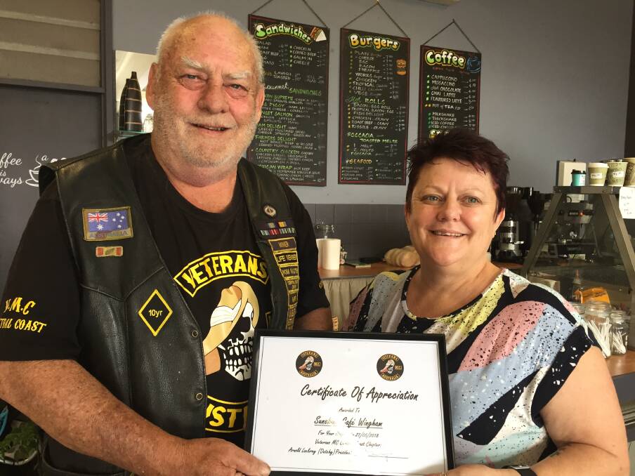 Thankful: Veterans Motorcycle Club member Jeff Smith and Therese Saxby of Sunnyside Cafe. Photo: Julia Driscoll