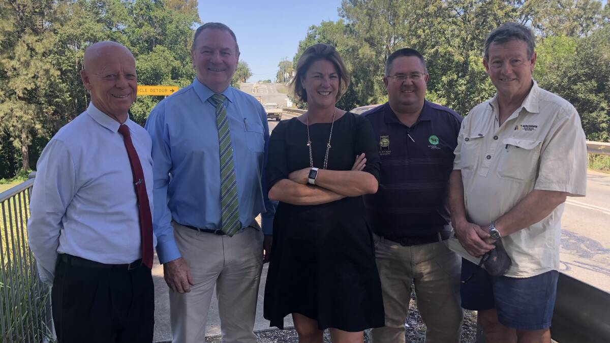 MidCoast Council mayor David West, Member for Myall Lakes Stephen Bromhead, NSW Minister for Roads, Transport and Freight Melinda Pavey, general manager of Wingham Beef Exports Grant Coleman and Ralph Blenkin of Machin's Sawmill at Cedar Party Creek Bridge. Photo provided