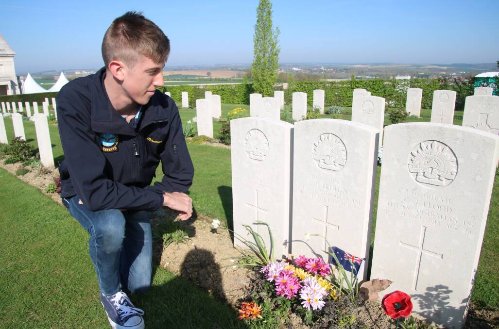 Paying his respects: Galen Wiseman at the grave site of Private CJ Bruton, who was from the Manning Valley, at the Australian War Memorial Cemetary in Villers-Btetonneux. Photo: submitted